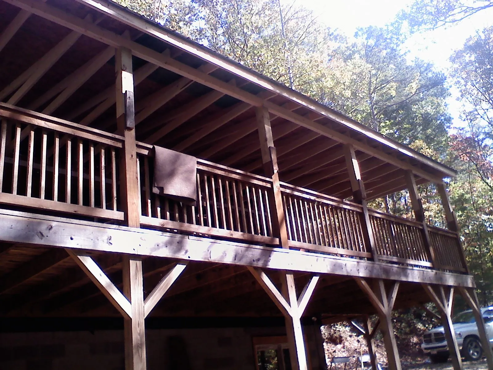 Timber framing under a new elevated porch and deck — Roof Leak Repair in Ecru by Roofing Brothers